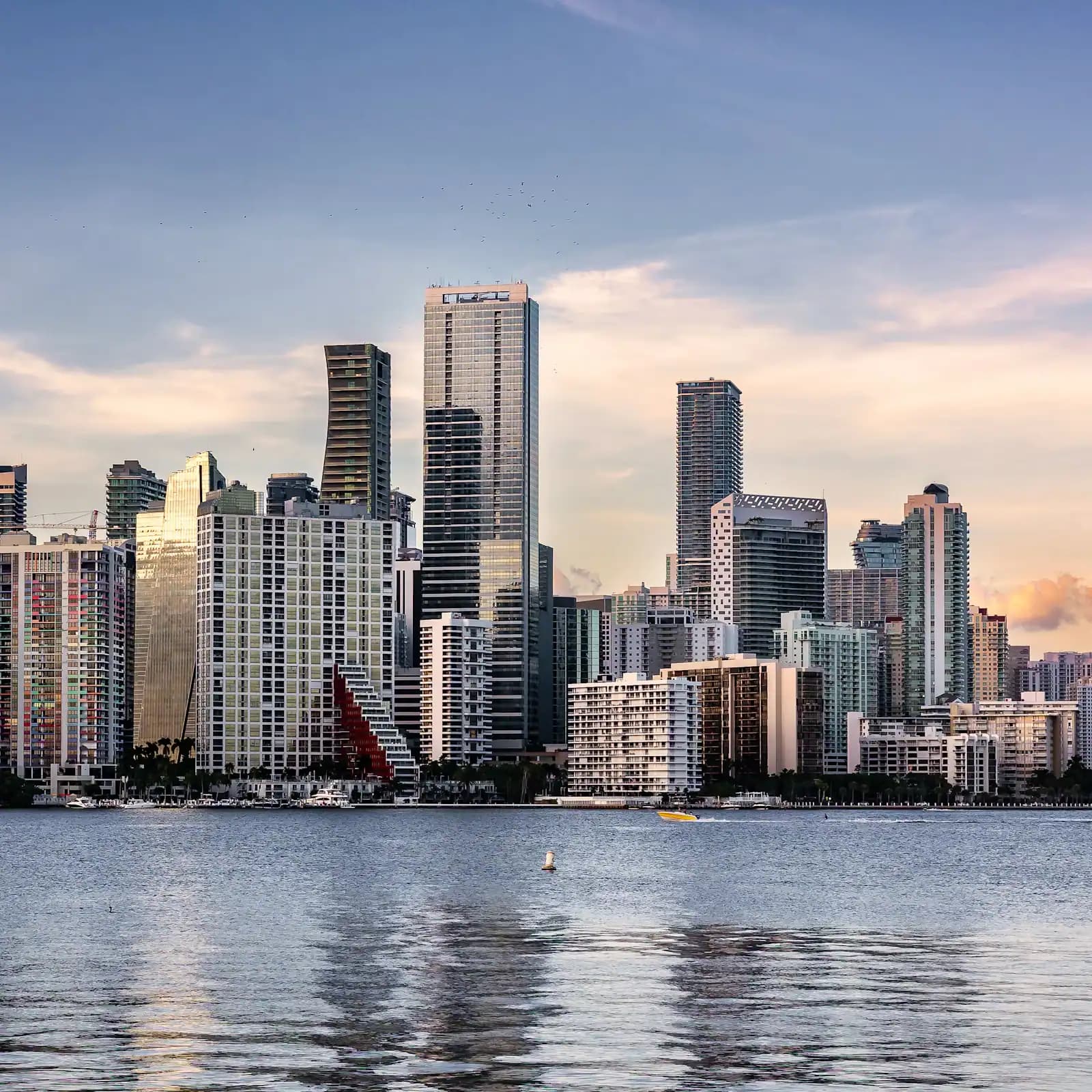 The Miami mainland skyline seen from across the open water of Biscayne Bay on a clear day
